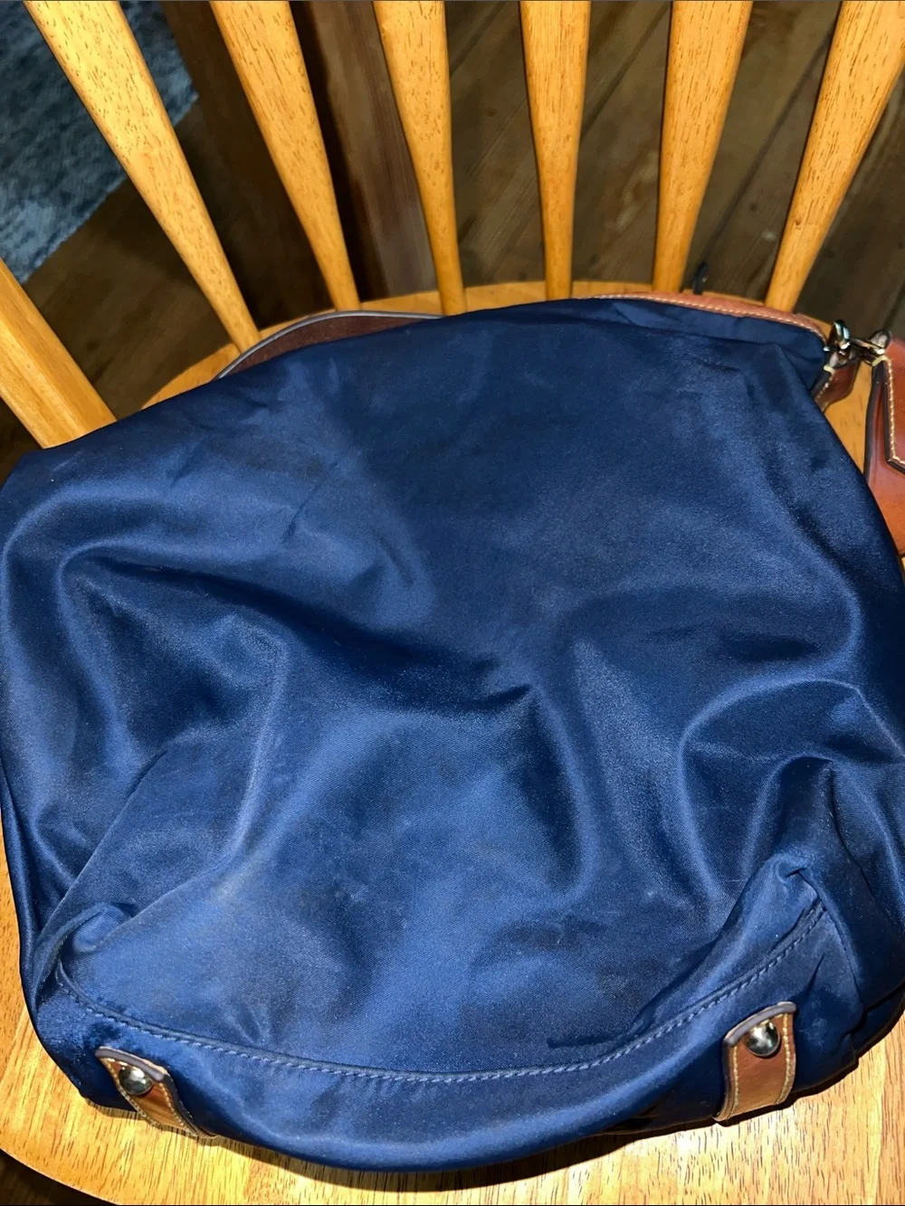 Dooney & Bourke Navy Nylon Messenger Bag with Brown Leather Trim and Red Accents
